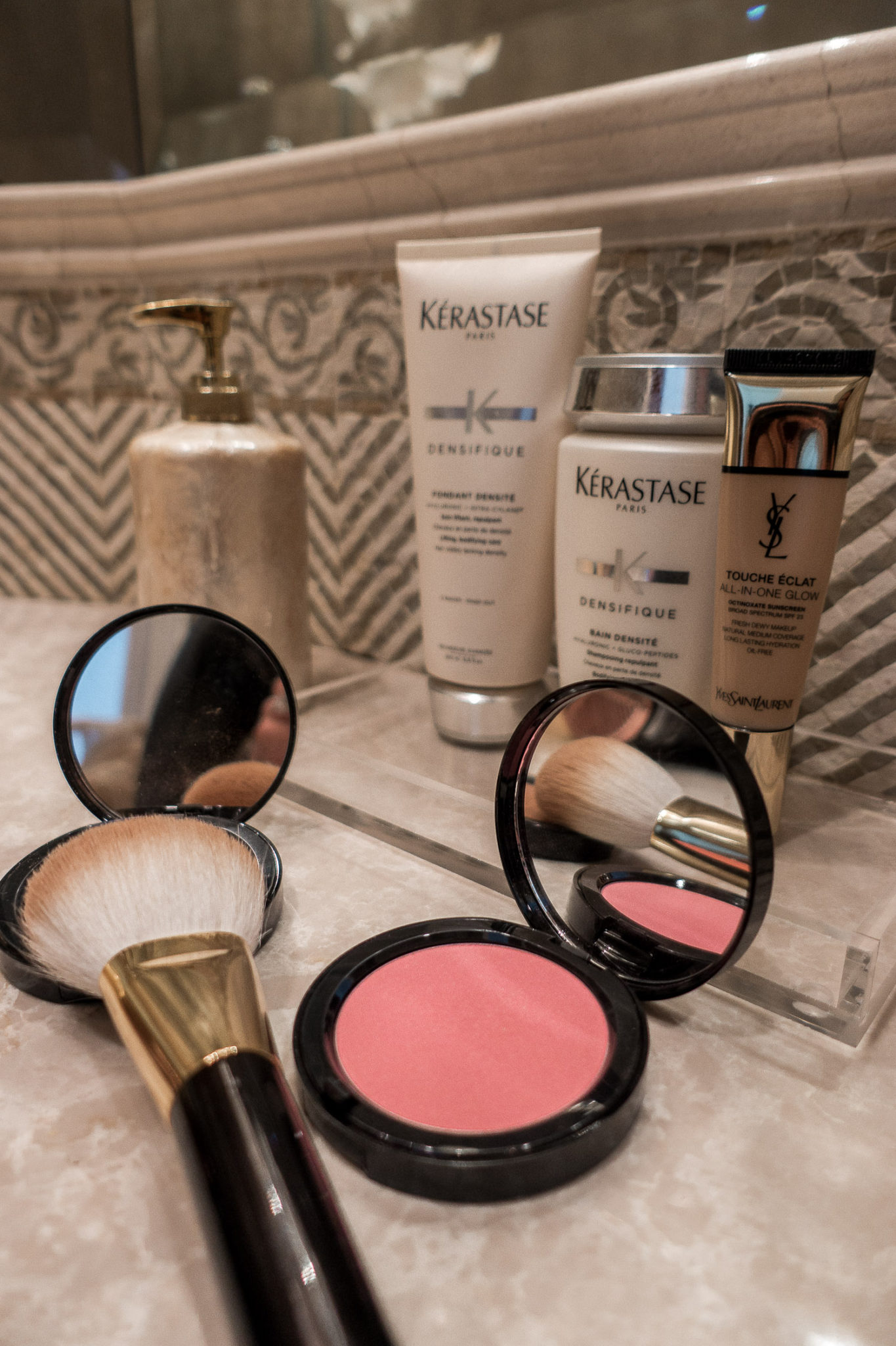 Amanda of A Glam Lifestyle shares her July beauty faves, including the YSL touche eclat all in one glow, Bobbi Brown bali brown bronzer and the Tom Ford bronzer brush
