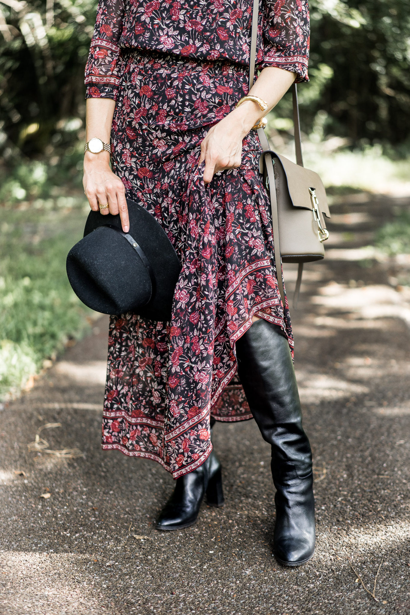 Amanda pairs her M.Gemi boots with a Joie dress from Rent the Runway