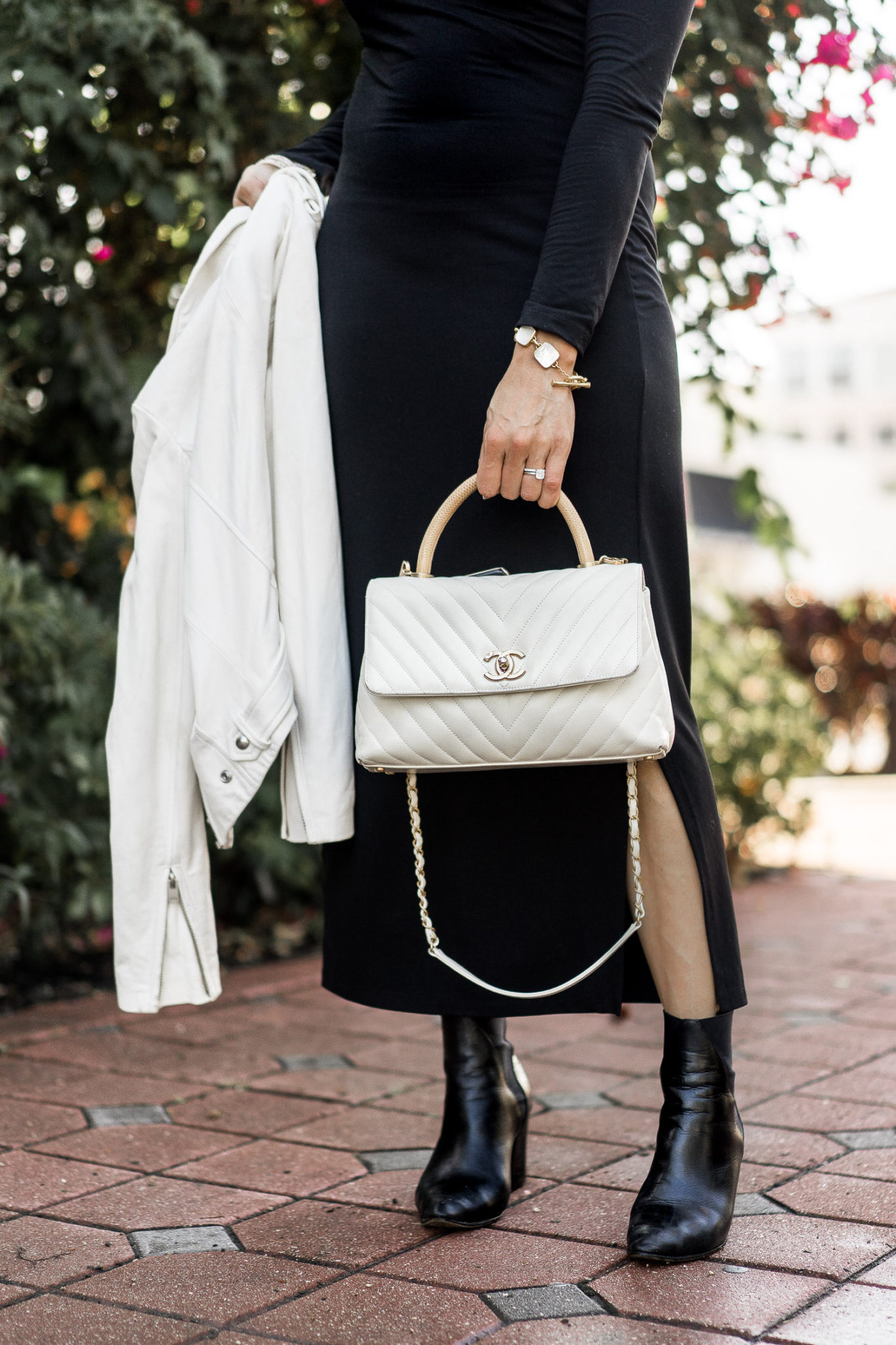 white chanel bag with black outfit