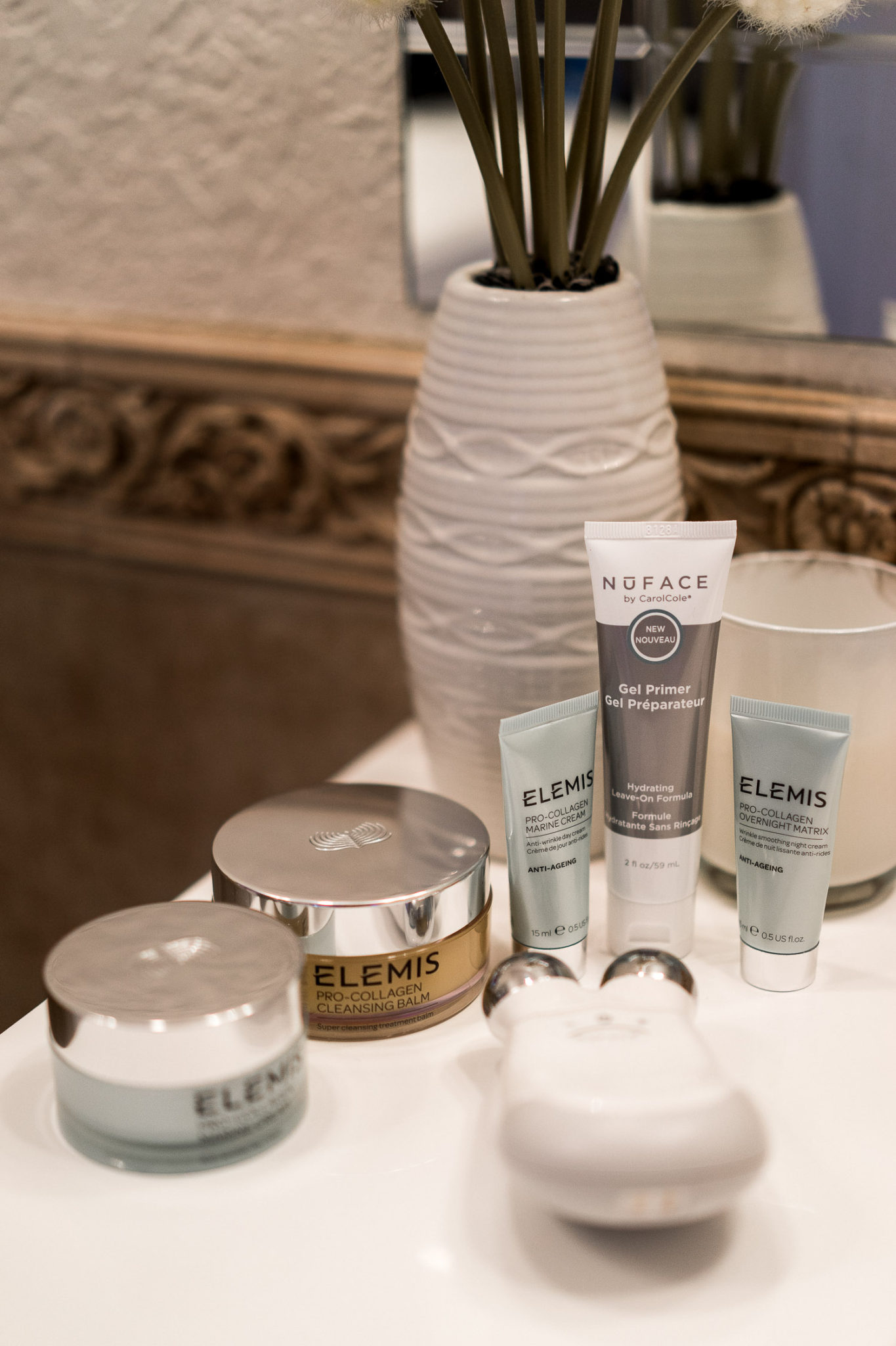Night beauty regimen with Nuface Trinity facial toning device and a set of Elemis products from the Skinstore