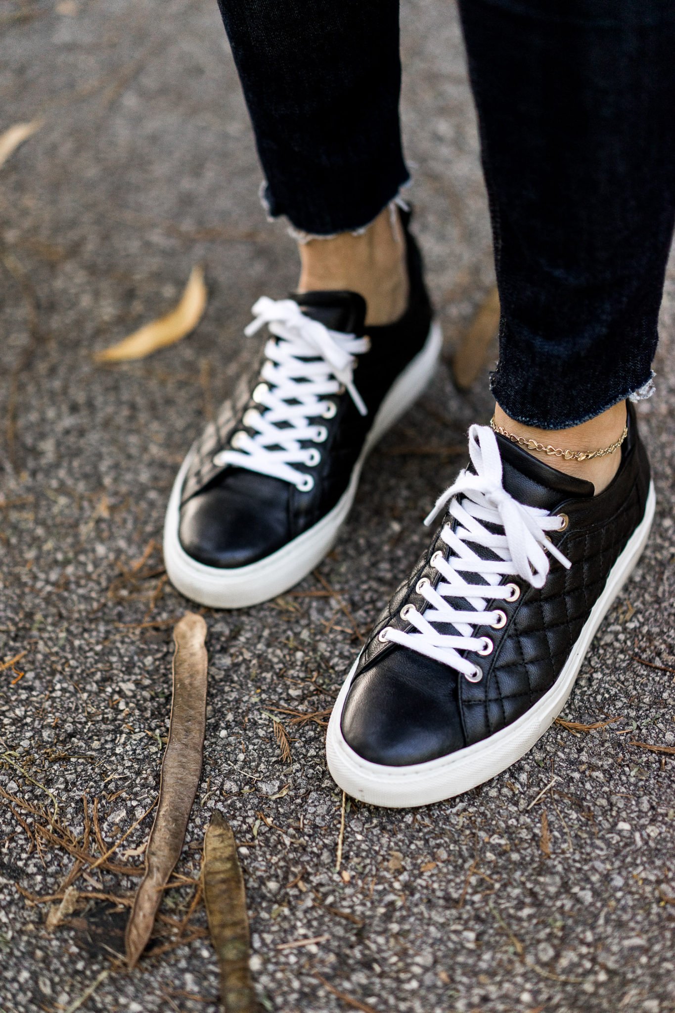 Amanda wears the M.Gemi Quilted Palestra sneaker which are included in their sale.