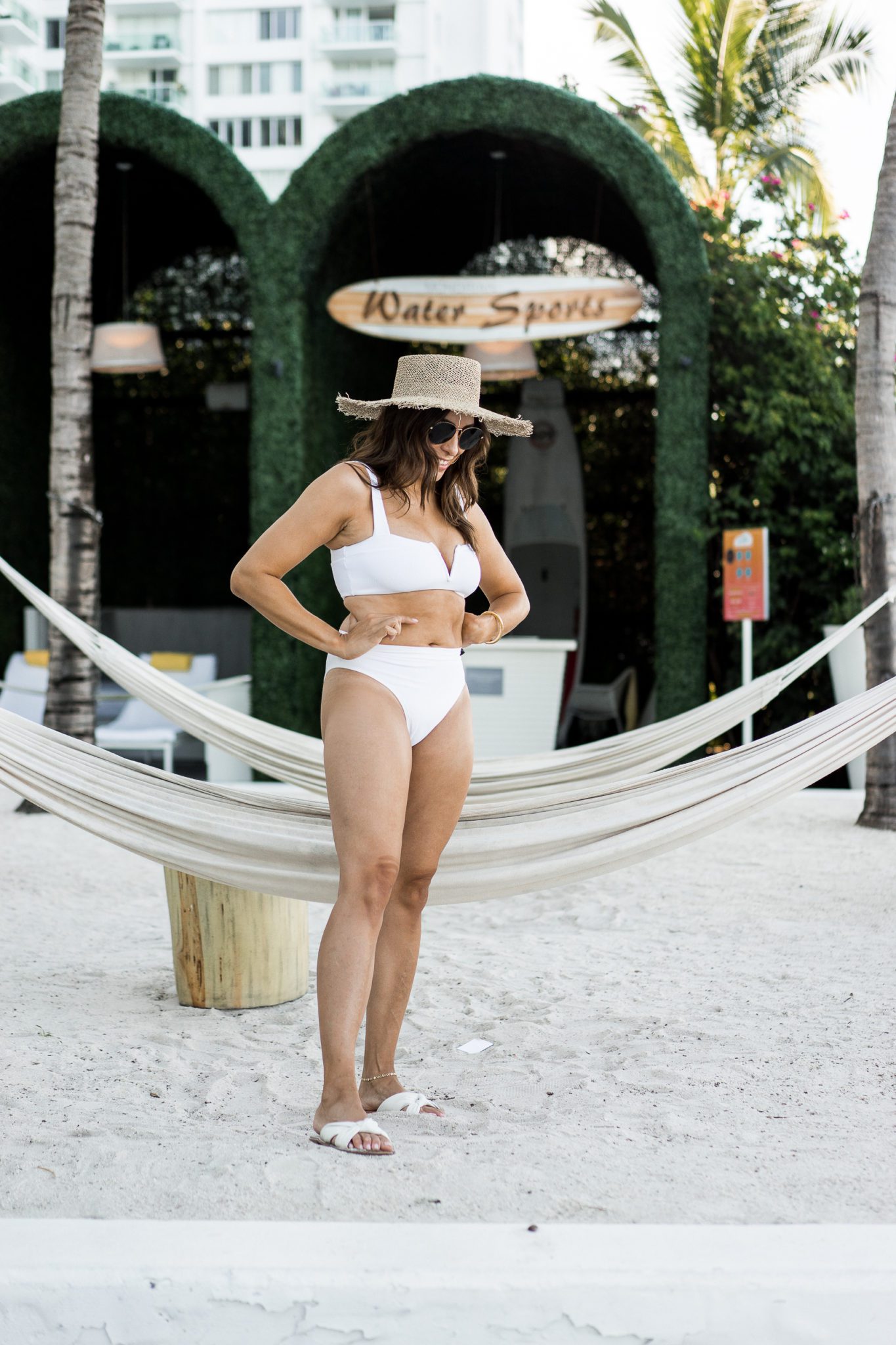 A Glam Lifestyle Blogger Amanda Champion wearing two piece swimsuit and sharing best swimsuits for every body type
