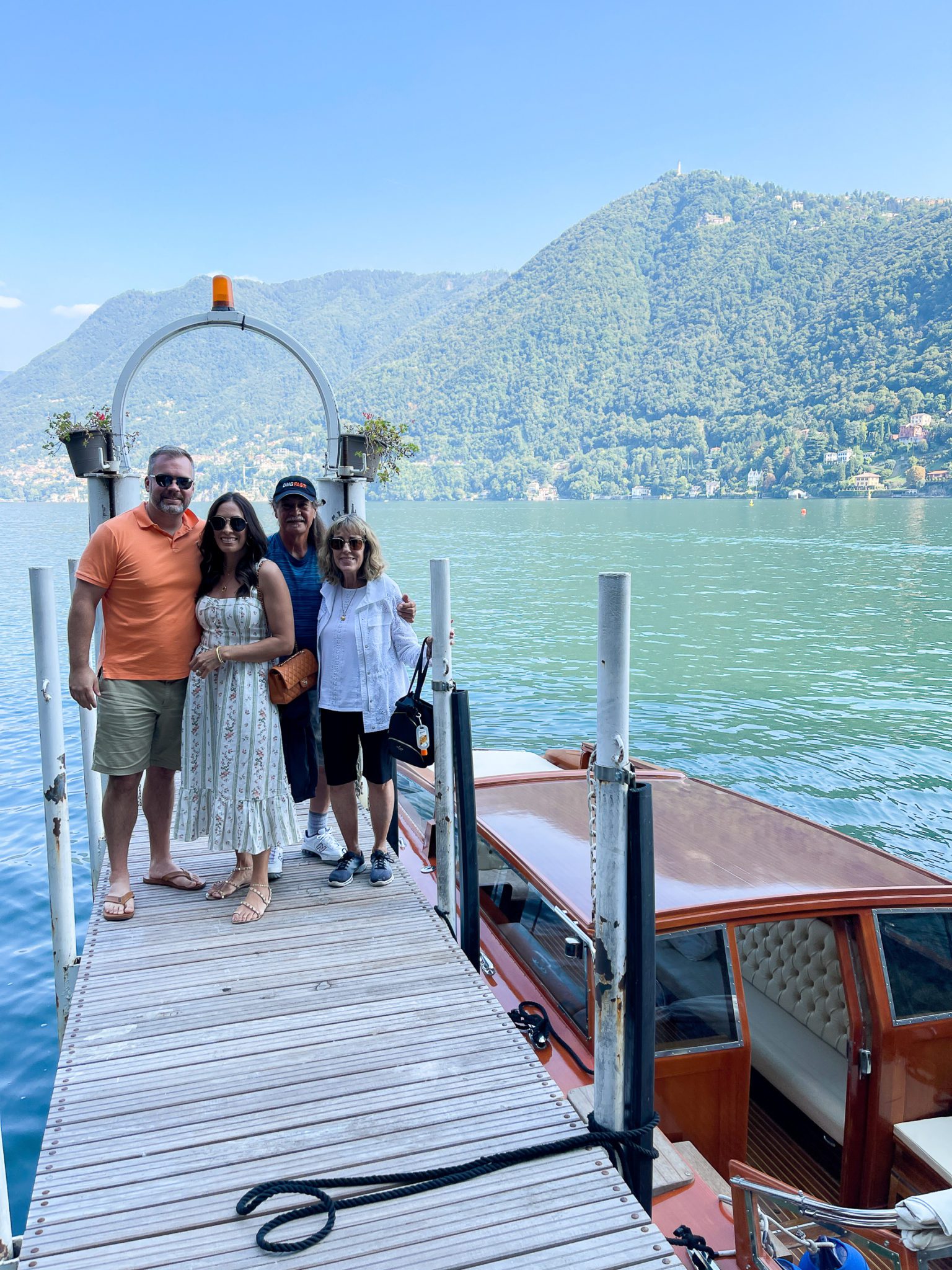 people near the dock sharing Lake Como travel guide