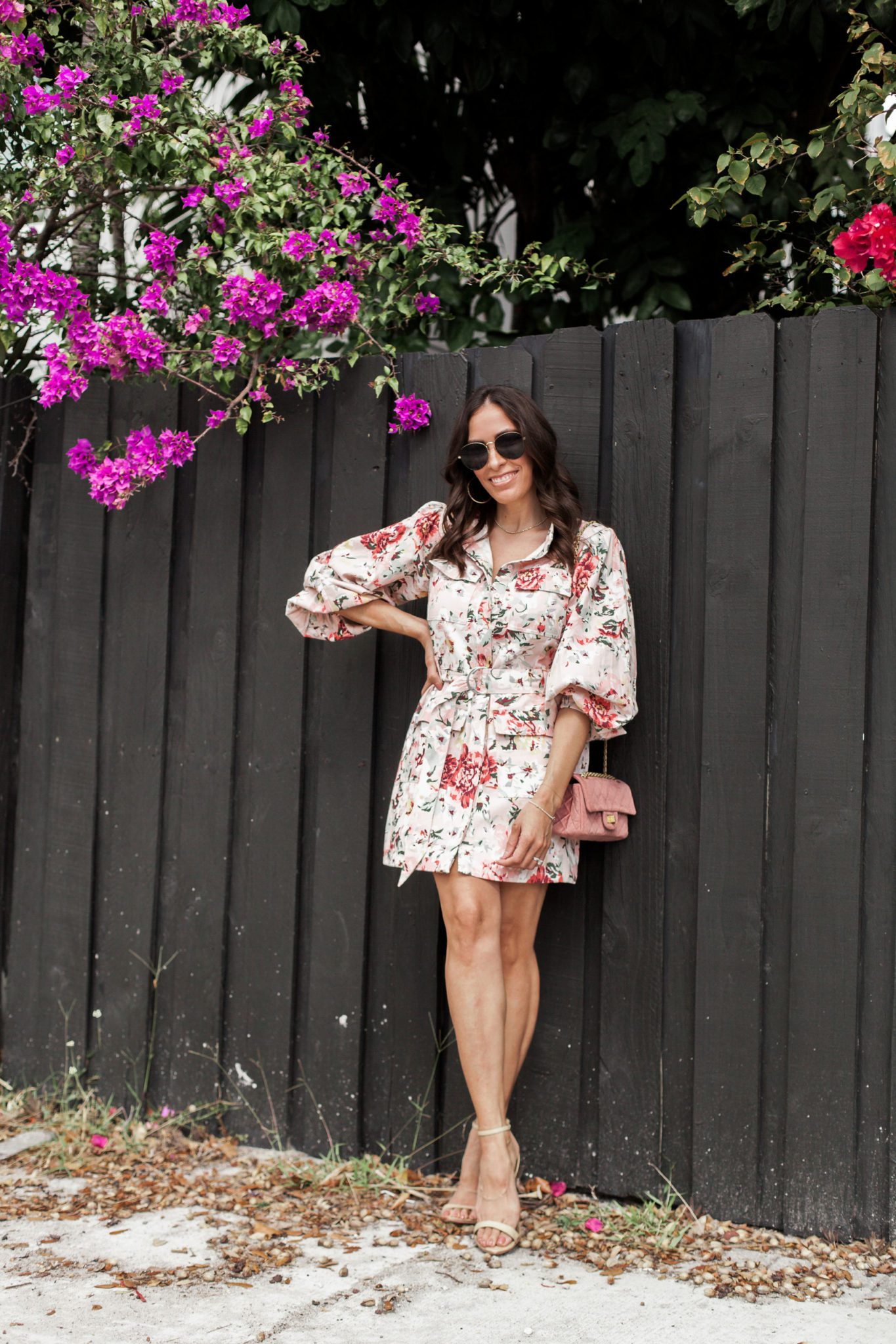 woman wearing floral dress and best heels for spring in nude